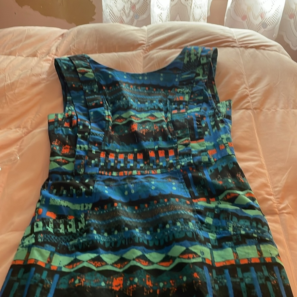 Boutique dress size 38 runs small, brand new dress never worn, cotton and nylon